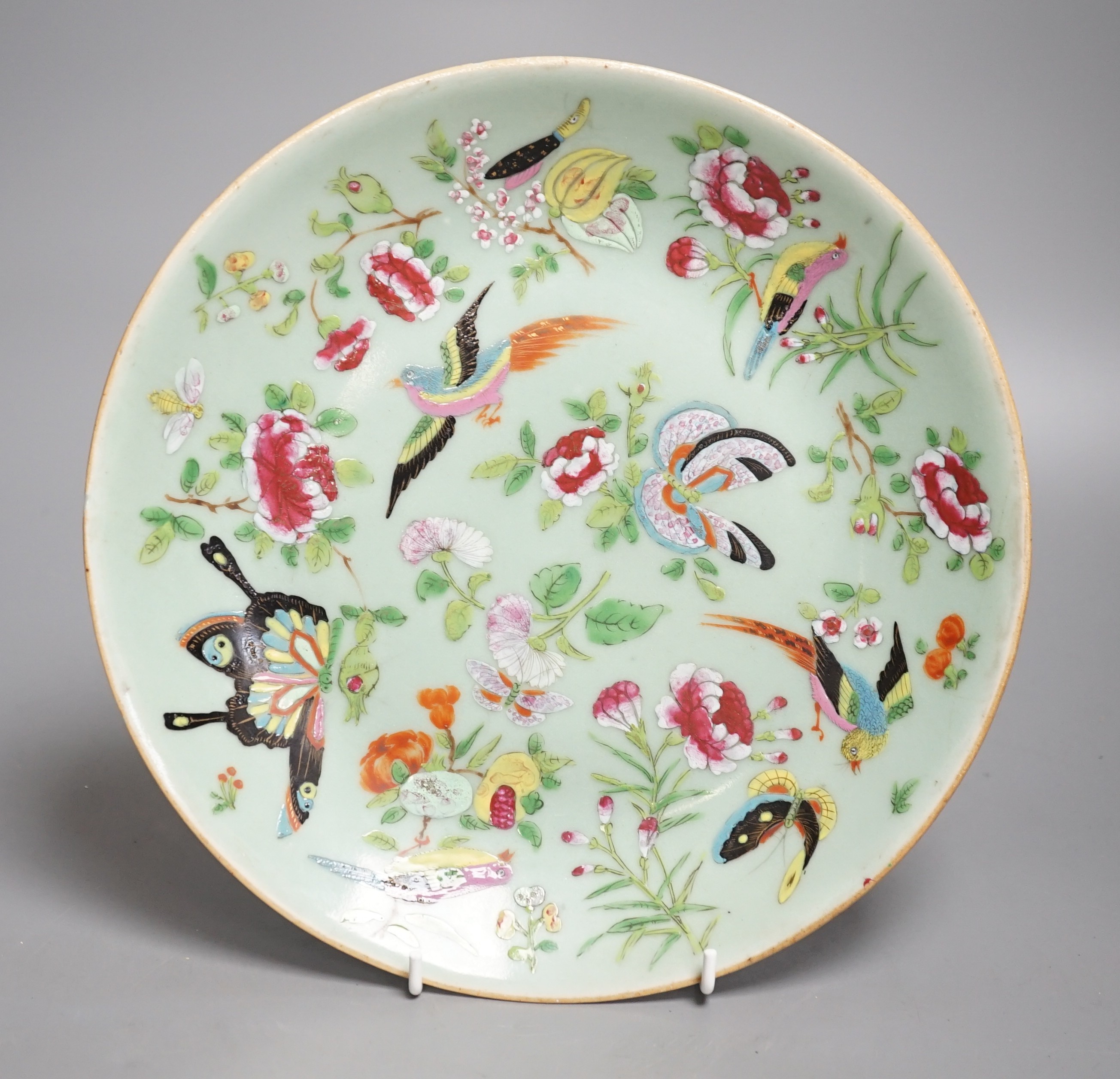 A Chinese celadon ground famille rose plate, Daoguang mark and of the period. 26cm diameter
